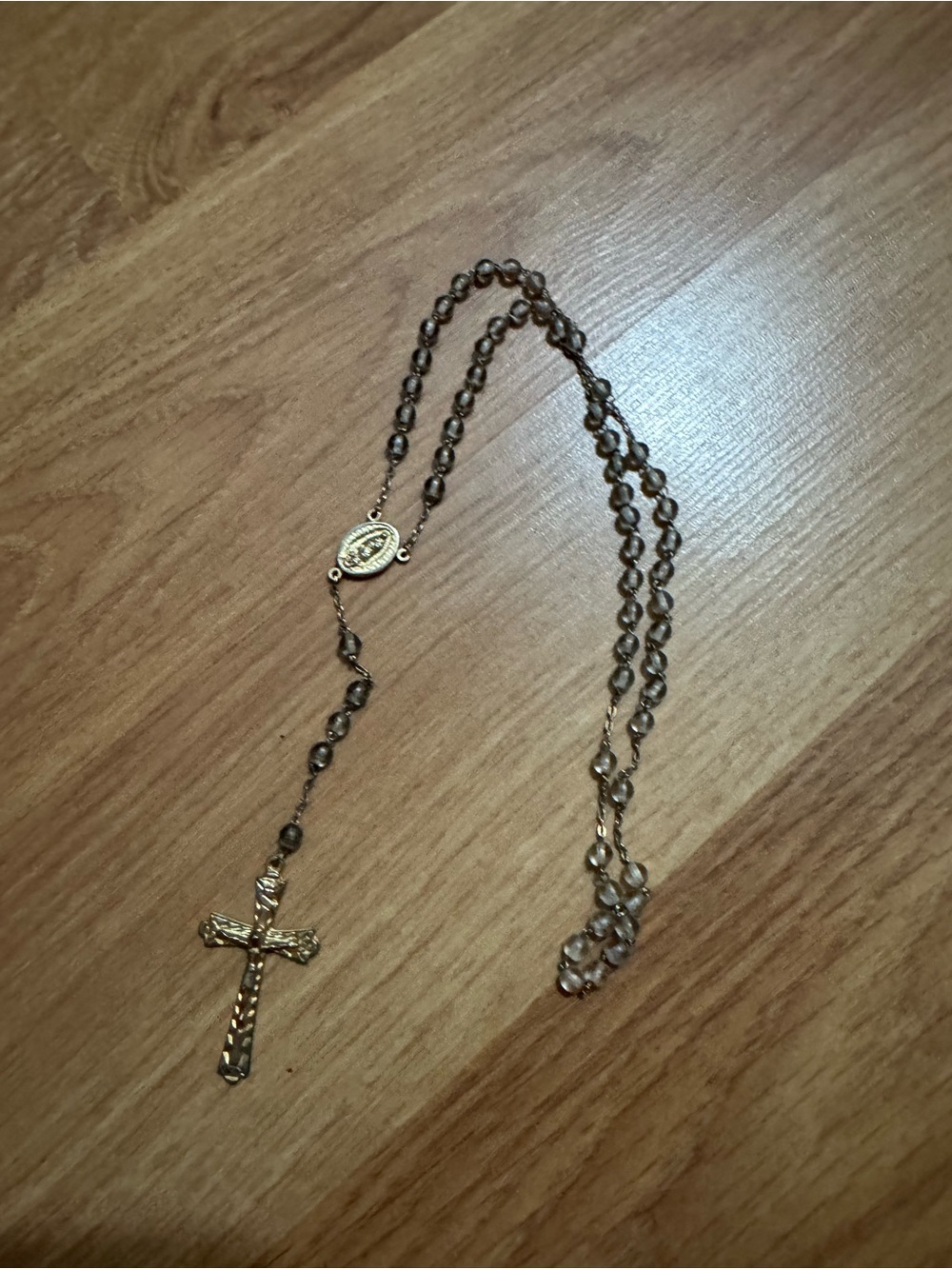 Grey glass bead crucifix with metal pendants